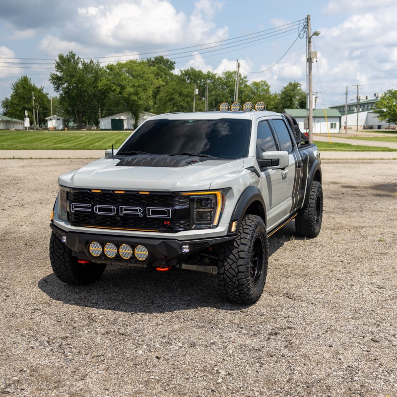 Custom Ford Raptor R in grey with black graphics, front three-quarter view